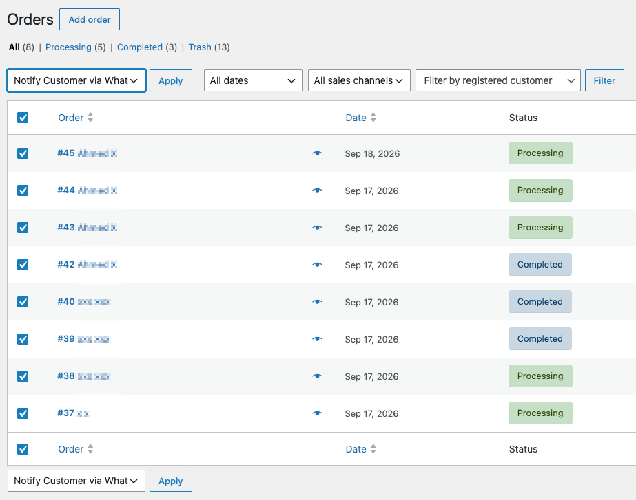 WooCommerce Orders list with three orders ticked and ‘Notify Customer via WhatsApp’ selected in the Bulk actions dropdown
